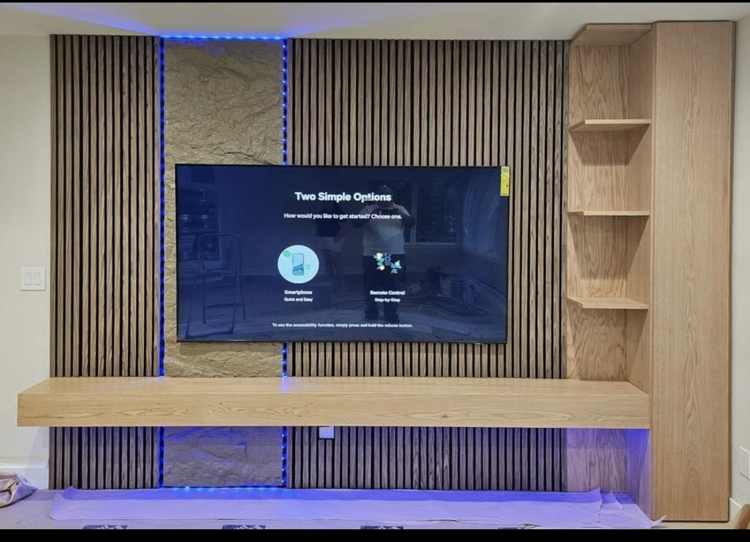 TV Accent Wall with Wooden Slats and Floating Shelf — before