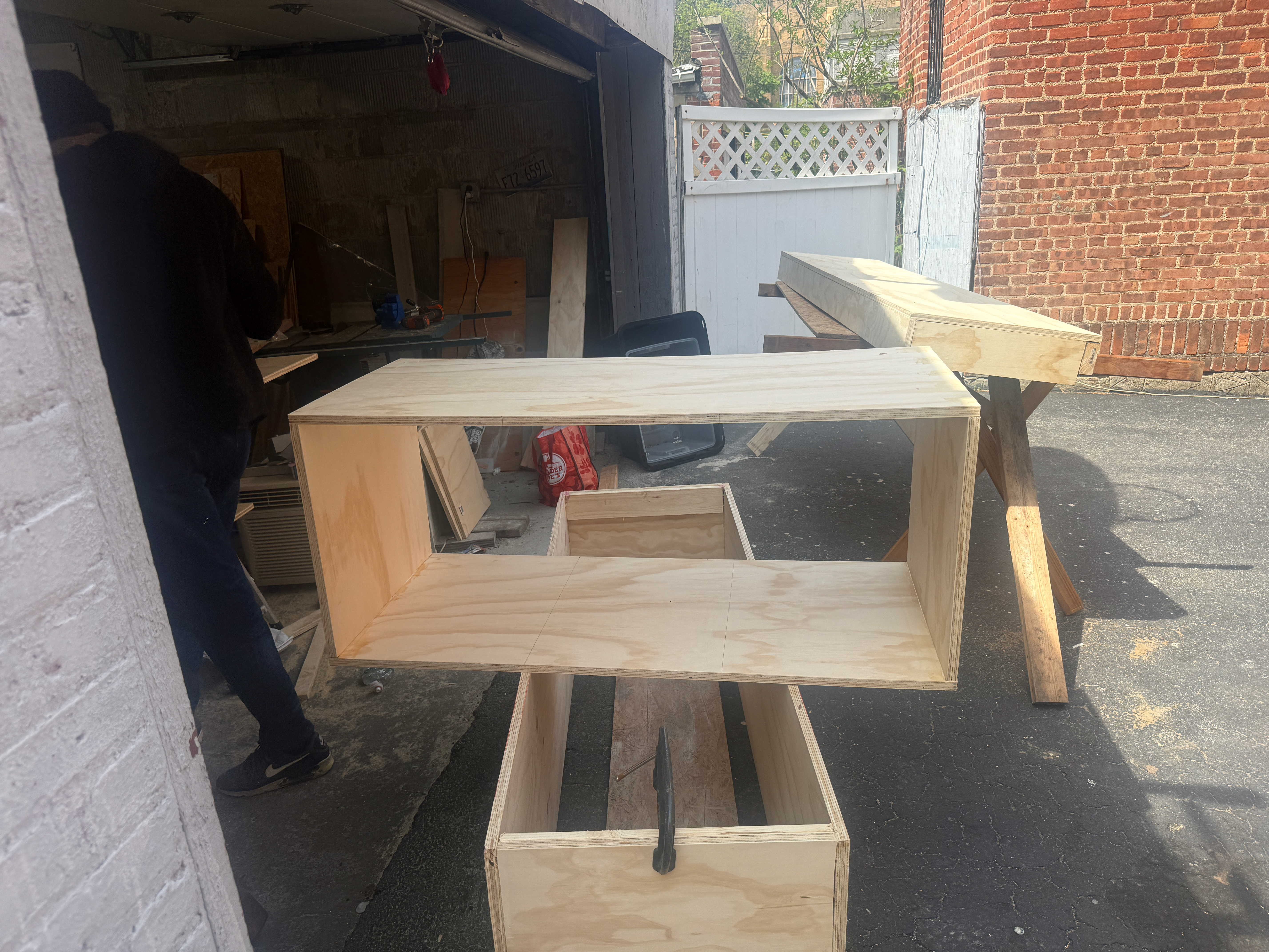 TV Accent Wall with Wooden Slats and Floating Shelf — during