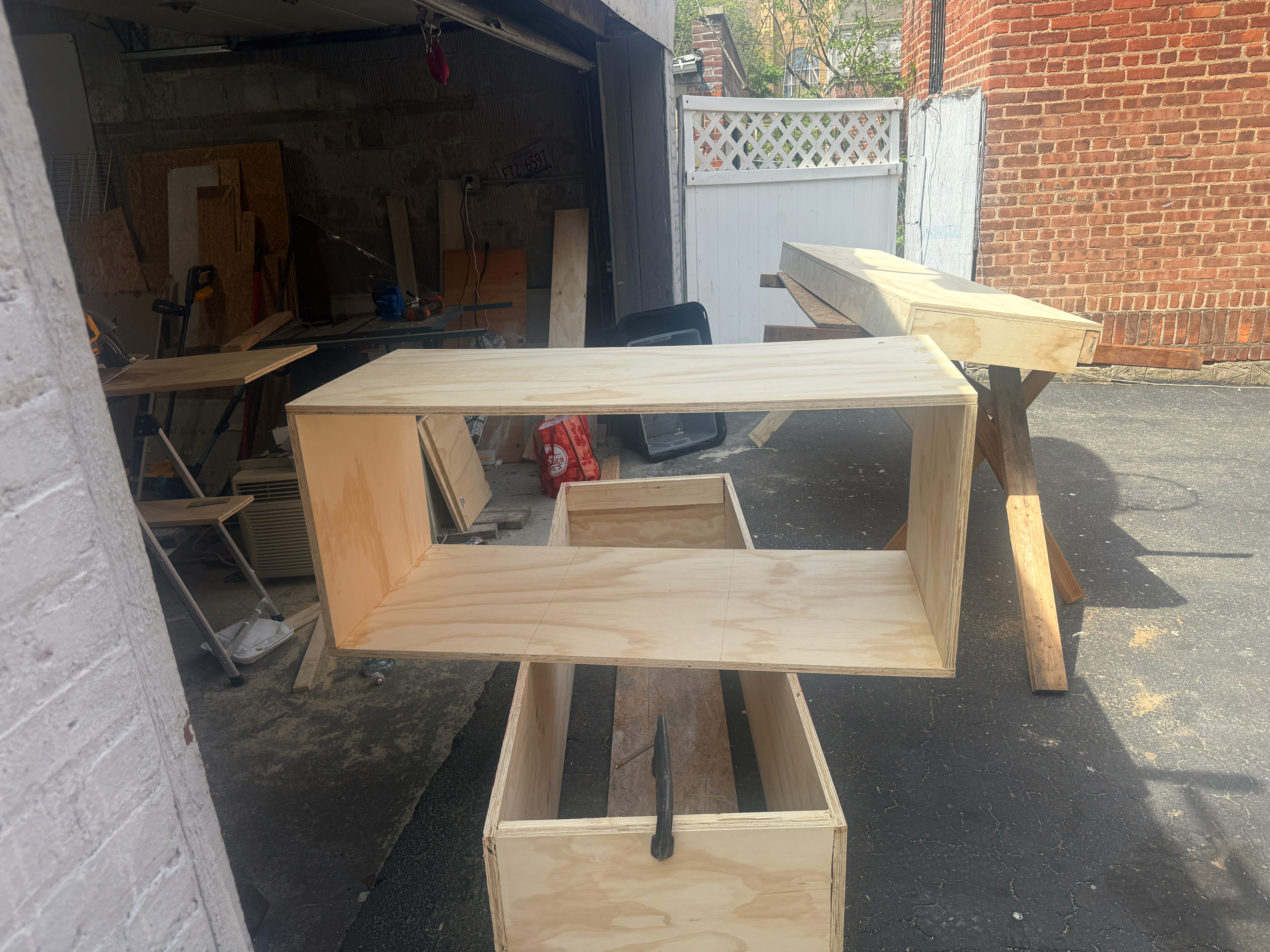 TV Accent Wall with Wooden Slats and Floating Shelf — during