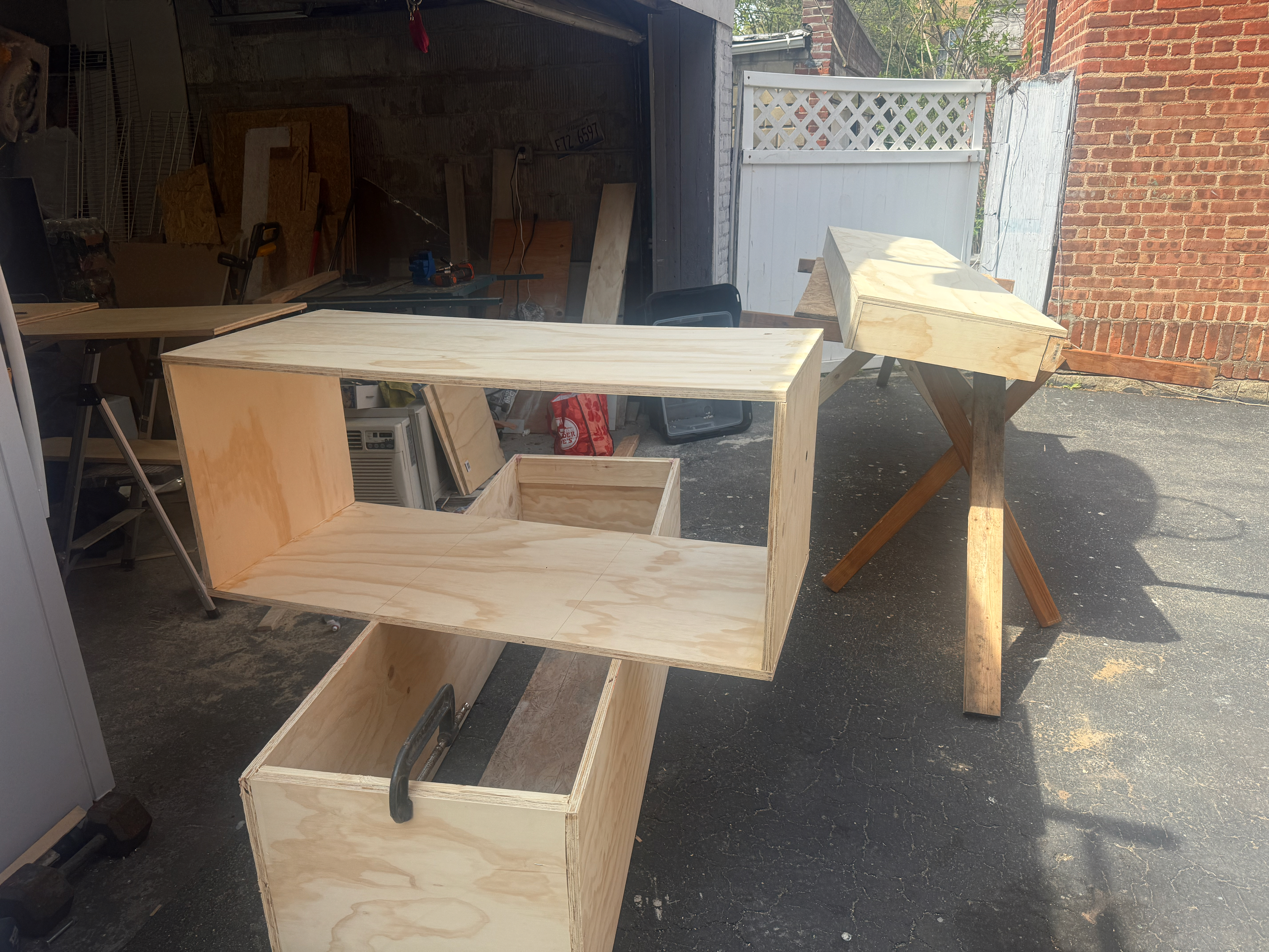 TV Accent Wall with Wooden Slats and Floating Shelf — during